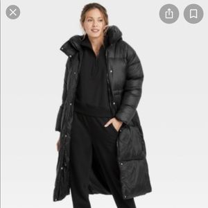 A new day water resistant coat size XS in black